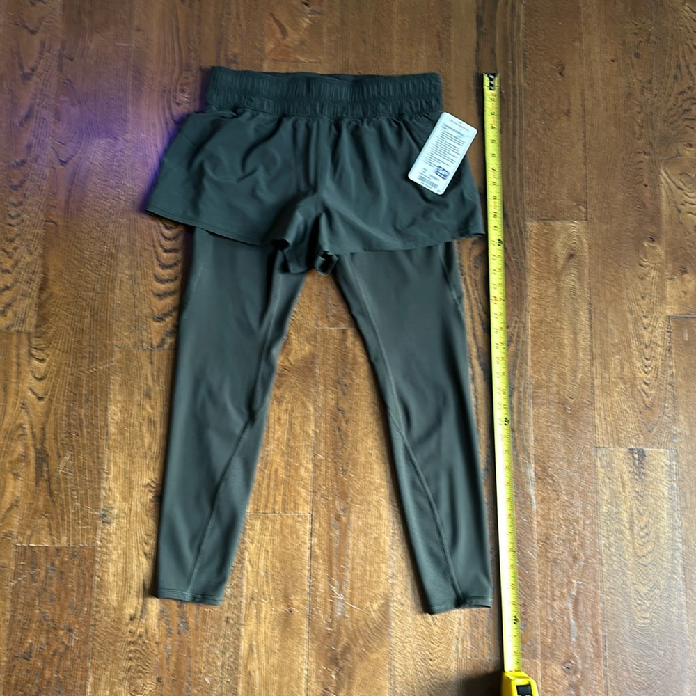 Lululemon leggings with attached shorts, size 10, Dark Green , New with the Tag
